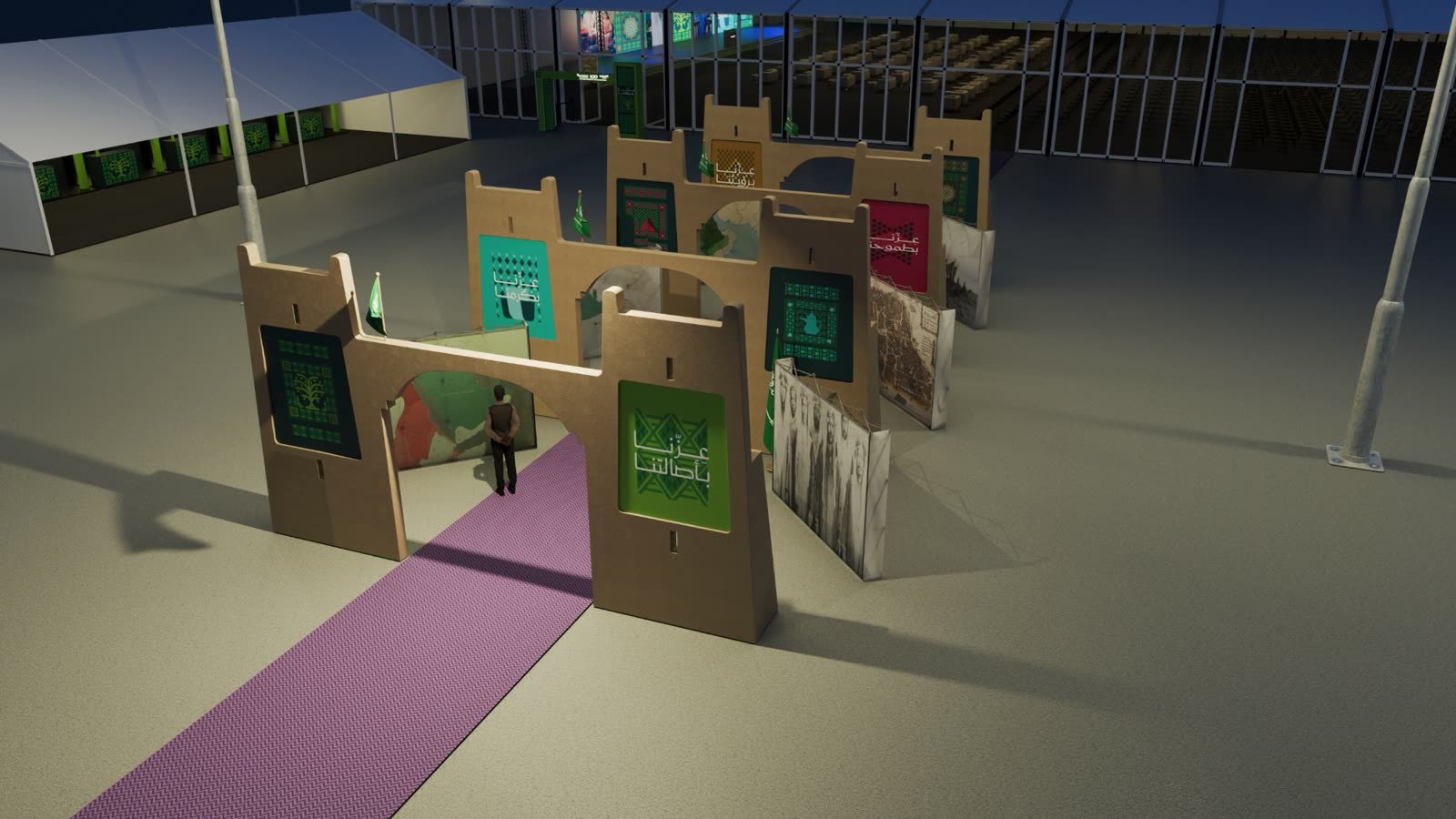 KJO National Day event: Heritage gate walkway with mud-brick arches and campaign panels